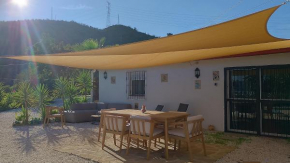 Casita Naranja, Alora